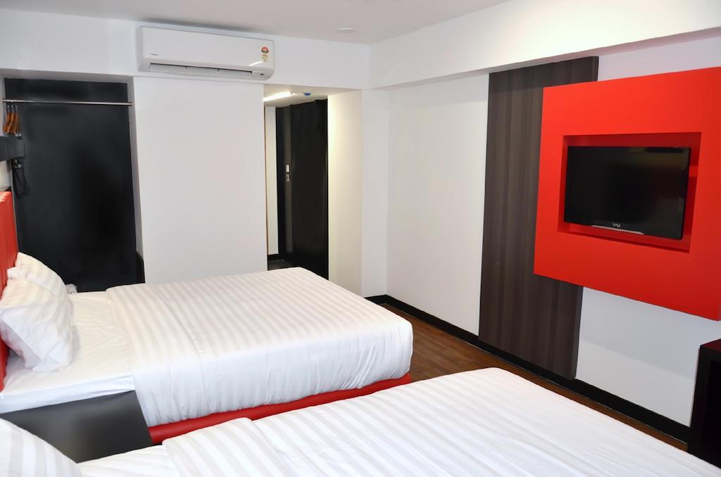 Mango Hotels Tune Ahmedabad Zimmer foto